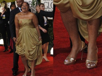 Mo'Nique sul red carpet dei Globes con suo marito Sid. L'attrice non perde occasione per mostrare le gambe, più pelose di quelle di un satiro!