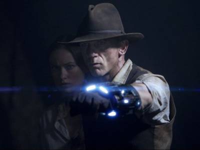 Daniel Craig e Olivia Wilde in una scena del film