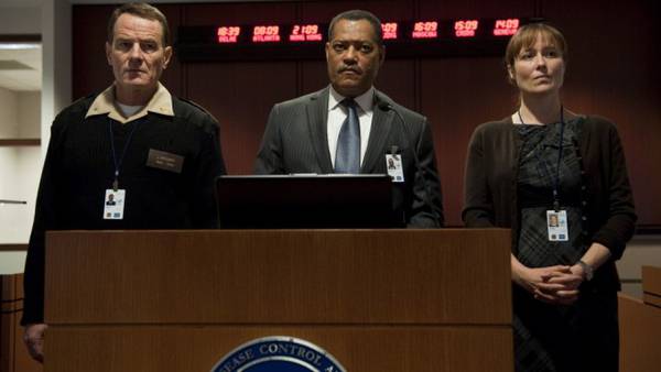 Contagion in DVD, intervista a Jennifer Ehle. Una scena del film con Cranston, Fishburne e la Ehle