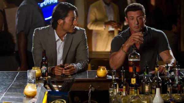 Jimmy Bobo Bullet to the Head recensione Sylvester Stallone - Stallone con Sung Kang