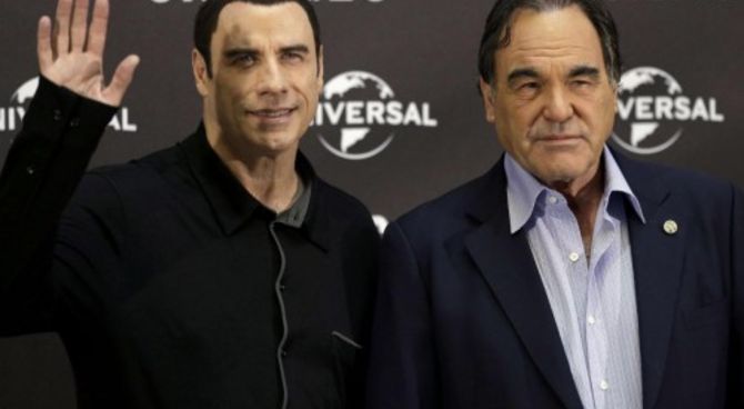 John Travolta e Oliver Stone